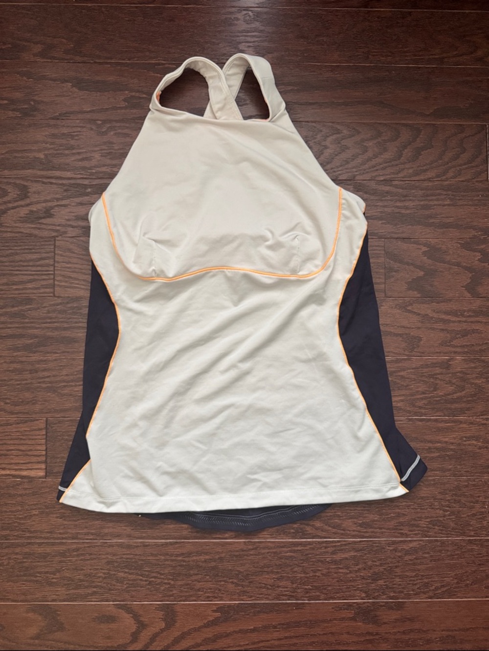 lululemon navy and white athletic tank with orange accents